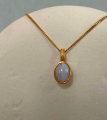 Серебряная подвеска на цепочке с голубым агатом в покрытии золотом (BRAIES)
